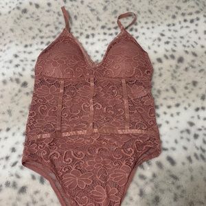 Blushed rose lace bodysuit. Size S/M